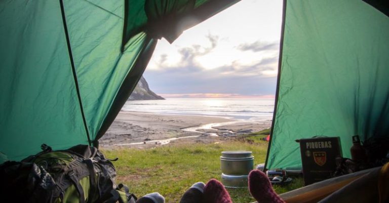 Camping - Two People Lying Inside Tent