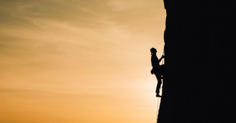 Climbing - Person Rock Climbing