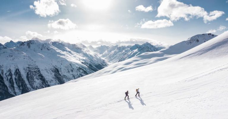 Climbing - Two Man Hiking on Snow Mountain