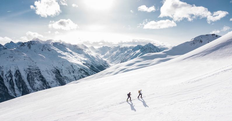 Climbing - Two Man Hiking on Snow Mountain